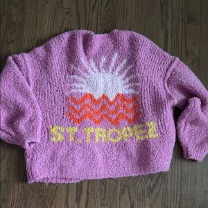 ADORABLE cardigan! Worn once! 
Beautiful color and fun design on back